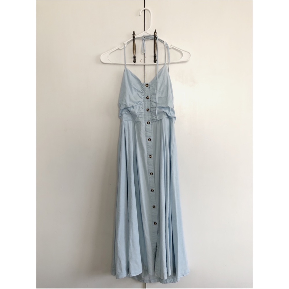 Mid-Length flowing blue halter dress.
